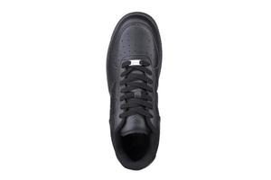 One black sneaker on a white background. Sport shoes. photo