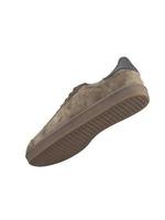 Suede brown sneaker on a white background. Men's sports shoes. photo