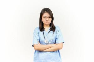 Angry Gesture Of Asian Young Doctor Isolated On White Background photo