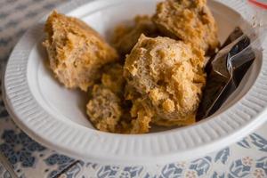 Close up photo of Tahu Walik Javanese traditional food with golden color. The photo is suitable to use for traditional food background, poster and food content media.