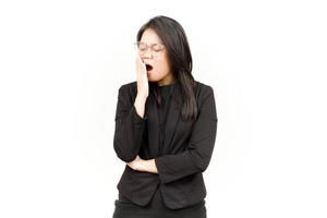 Yawning Gesture Of Beautiful Asian Woman Wearing Black Blazer Isolated On White Background photo