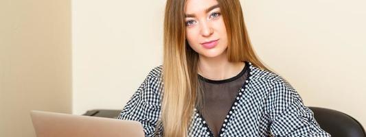 Woman working in an office photo