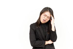 Suffering Headache Of Beautiful Asian Woman Wearing Black Blazer Isolated On White Background photo