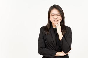 Suffering Toothache Of Beautiful Asian Woman Wearing Black Blazer Isolated On White Background photo