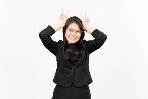 Showing Peace Sign Of Beautiful Asian Woman Wearing Black Blazer Isolated On White Background photo