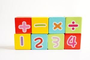 Number wood block cubes for learning Mathematic, education math concept. photo