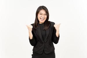 Showing Product and Pointing Right and Left Side Of Beautiful Asian Woman Wearing Black Blazer photo