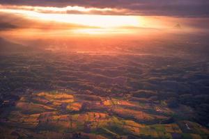 aerial view beautiful morning view from Indonesia about mountain and forest photo