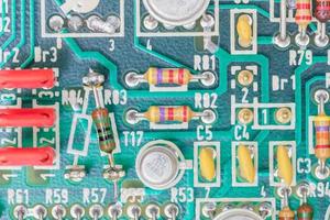 Condensers and Resistor assembly on the circuit board photo