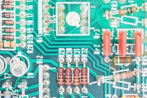 Condensers and Resistor assembly on the circuit board photo