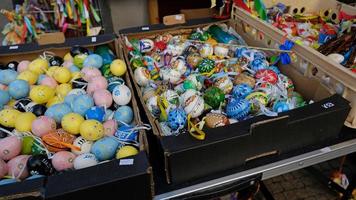 Beautiful colorful decor for Easter. Traditional Easter painted colorful eggs are sold at a market in Prague, Czech Republic. photo