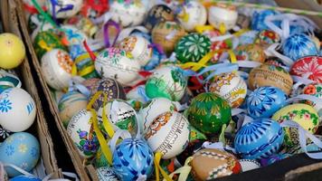 Beautiful colorful decor for Easter. Traditional Easter painted colorful eggs. Selective focus. photo