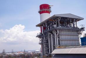 Landscape photo of chimney and stack of combine cycle power plant project. The photo is suitable to use for industry background photography, power plant poster and electricity content media.