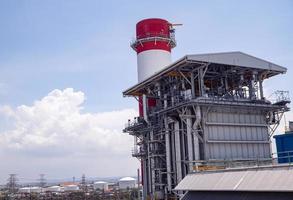 Landscape photo of chimney and stack of combine cycle power plant project. The photo is suitable to use for industry background photography, power plant poster and electricity content media.