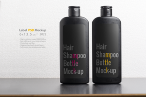 svart hår schampo flaskor i främre av ljus grå bakgrund psd