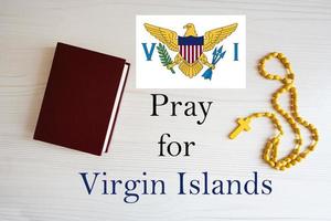 Pray for Virgin Islands. Rosary and Holy Bible background. photo