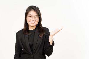 Showing and Presenting Product on Open Palm Of Beautiful Asian Woman Wearing Black Blazer photo