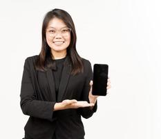 Showing Apps or Ads On Blank Screen Smartphone Of Beautiful Asian Woman Wearing Black Blazer photo