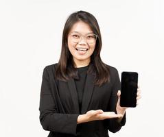 Showing Apps or Ads On Blank Screen Smartphone Of Beautiful Asian Woman Wearing Black Blazer photo