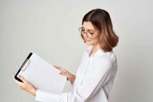 Business woman in white shirt wearing glasses office professional photo