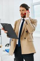 businessman in the office with documents executive photo