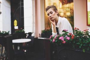 short haired woman outdoors rest fun walking around town communication photo