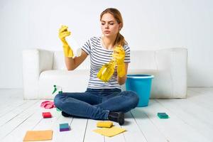 Woman home cleaning housework care detergent interior photo