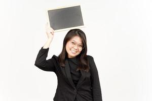 Showing, Presenting and holding Blank Blackboard Of Beautiful Asian Woman Wearing Black Blazer photo