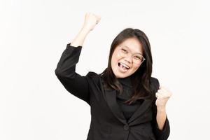 Yes and Celebration Gesture Of Beautiful Asian Woman Wearing Black Blazer Isolated On White photo