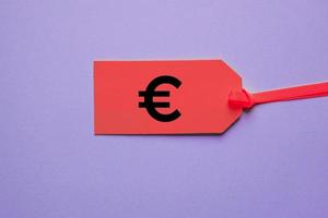 euro sign on the red price tag for sales photo