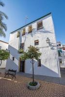 Cordoba streets and white painted houses with original architecture photo