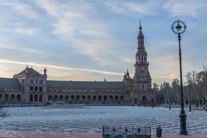 Plaza de Espana is a square located in Seville, Spain and was built for the Iberian-American Expo, and it has an important place in Spanish architecture photo