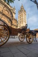 Seville Cathedral is the third largest church in the world and one of the beautiful examples of Gothic and baroque architectural styles and  Giralda the bell tower of  is 104.1 meters high photo