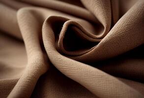 The fabric is brown. Beige silk or satin luxury fabric texture abstract background. photo