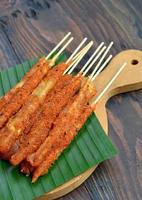 cilung or aci digulung food made from tapioca flour, traditional food from indonesia photo