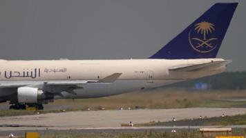 FRANKFURT AM MAIN, GERMANY JULY 18, 2017 - Saudi Arabian Cargo Boeing 747 taxiing before departure. Fraport, Frankfurt, Germany video