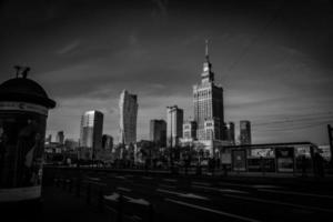 view of the center of Warsaw Poland on a sunny day with the palace of culture and science and skyscrapers photo