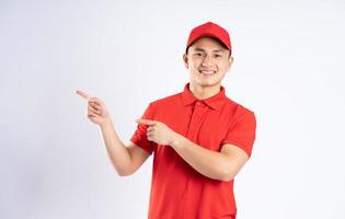 portrait of asian delivery man on white background photo