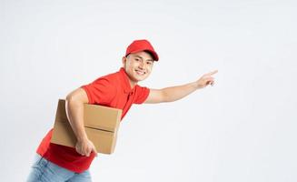 portrait of asian delivery man on white background photo