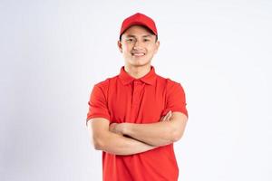 portrait of asian delivery man on white background photo