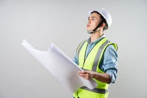 Asian engineer portrait on gray background photo