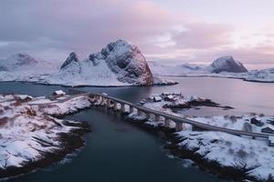 Aerial view of Lofoten islands in winter at sunset in Norway. Landscape with blue sea photo