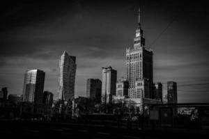 view of the center of Warsaw Poland on a sunny day with the palace of culture and science and skyscrapers photo