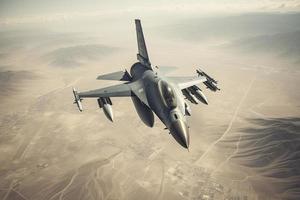 aerial high view of a generic military fighter jet crosses over a target bombing location during a special operation photo