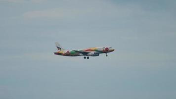 PHUKET, THAILAND NOVEMBER 27, 2017 - Passenger plane of Bangkok Air flies to land in Phuet airport, side view long shot. Tourism and travel concept video