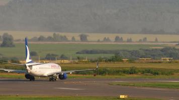 KAZAN, RUSSIA AUGUST 05, 2022 - Boeing 737, TC JFI of AnadoluJet airline taxiing at Kazan airport, long shot video