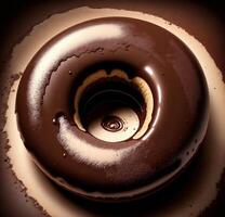 A chocolate doughnut with chocolate icing and a chocolate glaze photo