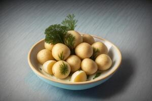 Young boiled potatoes with dill parsley and onions photo