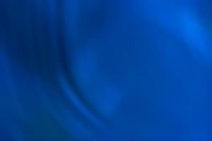 Blue abstract background with waves photo