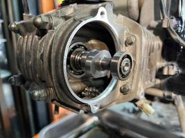 motorcycle service engine repair close up.  Maintenance of motorcycle engine. photo